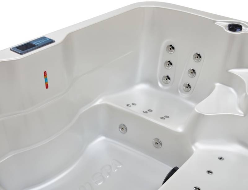 Zoom sur l’assise ergonomique du Spa Rio installé à Vitrolles, avec ses jets hydromassants ciblés pour un confort musculaire optimal.