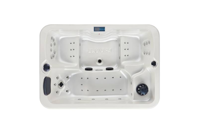 Une vue complète du Spa Rio à Vitrolles, révélant sa disposition astucieuse avec deux places assises et une place allongée pour un moment de relaxation sur-mesure.